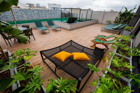 This apartment in São Paulo's Vila Olímpia neighborhood offers a rooftop with panoramic views, modern amenities, and easy access to leisure and work opportunities.