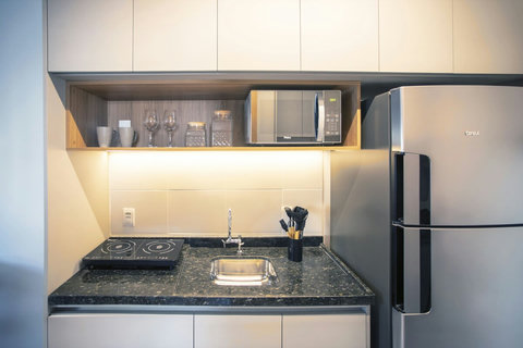 This studio apartment in Vila Olímpia is ideal for couples seeking comfort and convenience in São Paulo. 