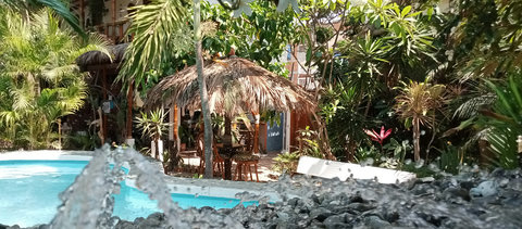 pool and social area under our tiki hut