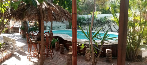 pool and social area under our tiki hut