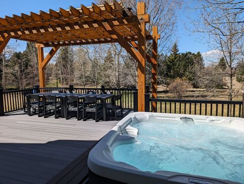 hot tub on patio right outside master bedroom