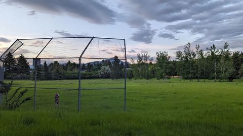 Home backs up to 15 acre park with baseball field