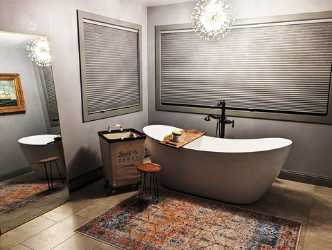 Relax in a huge soaking tub in the main bathroom