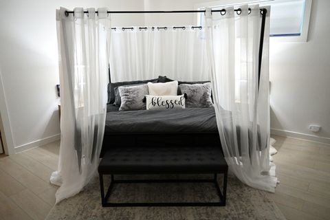 Master King-sized canopy bed
