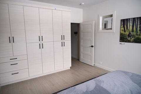 Ample cabinetry within the bedroom