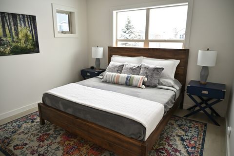 Main bedroom with King size bed and smart lamps. "Alexa, turn on the Bungalow"