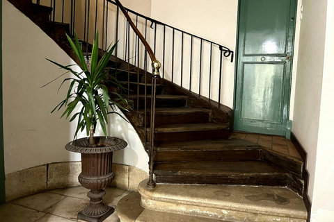 You'll need to go up these few steps to the 1st floor, please watch your luggages and safety, and also please take care of these beautiful wooden stairs.