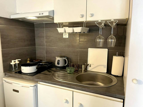 Full kitchen

Coffee· Coffee maker· Stove· Cooking Basics·  Dishes and silverware· Hot water kettle· Wine glasses· Microwave