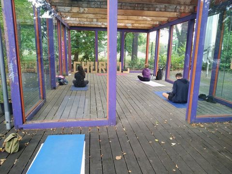 Drop-in outdoor yoga class in the nearby  Volkspark Friedrichshain.