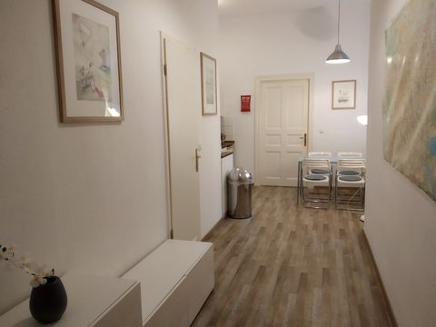 Hallway with paintings by the Dutch artist Urian Hopman