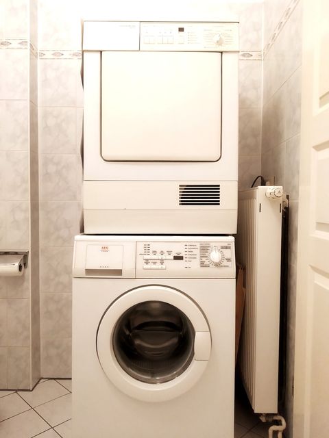 Washing machine and dryer. Washing powder is also provided.
