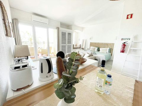 Kitchen: Dining table decoration and appliances.