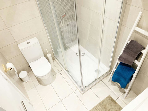 Bathroom: High view to toilette and shower