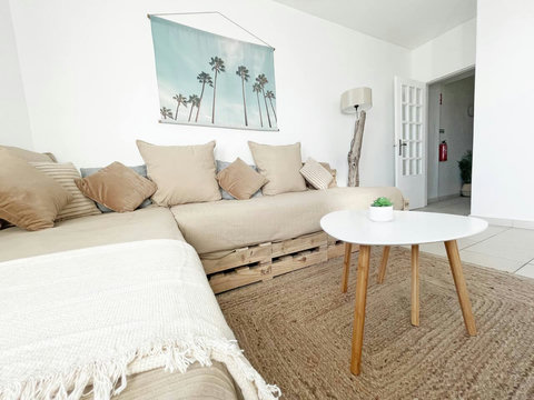 Living room: View to the hand made palette sofa (with comfy real mattresses)