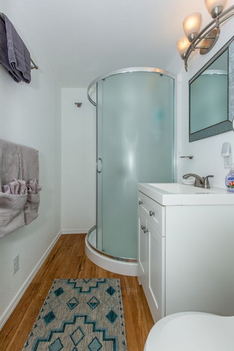 All new fixtures and tile in this cozy, modern bathroom.