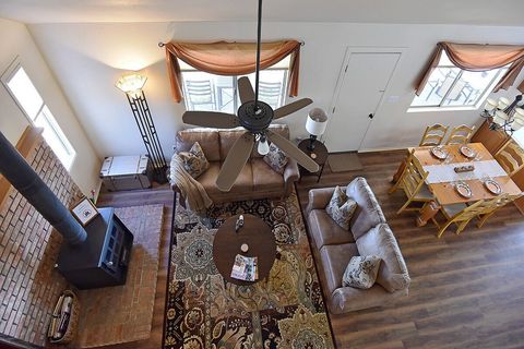View of Great Room and Dining Room from balcony.