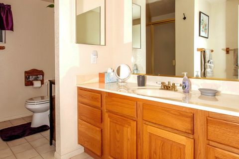 Balcony bathroom is located between the two bedrooms. Includes plenty of counter/vanity space to stash your stuff.