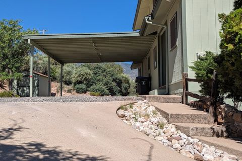 Space for two cars under carport. Gas grill available, as well as outdoor games in deck box. 