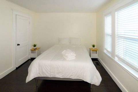 Bedroom one with queen bed