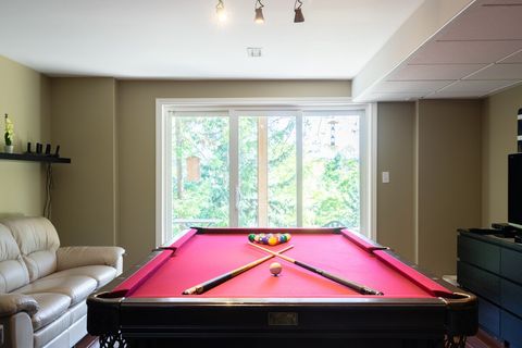 Pool Table with Walkout to Deck