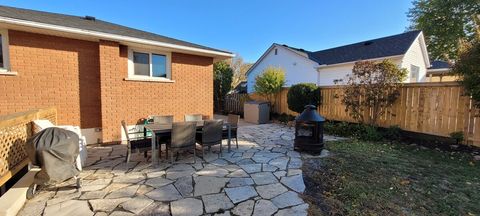 Shared backyard with plenty of seating, charcoal BBQ and fire pit.