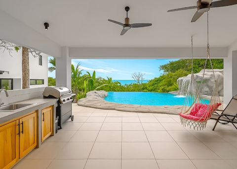 Outdoor Lounge: Enjoy breathtaking views from the poolside hammock while grilling under the sun!