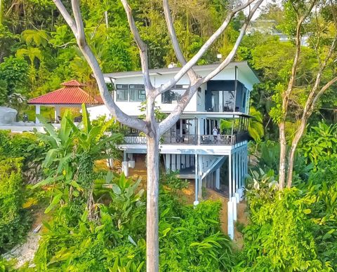 Exterior Retreat: Elevate your stay amid lush greenery and stunning views of Uvita paradise!