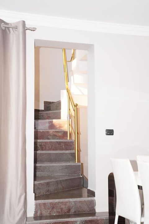 Stairs leading to the first floor