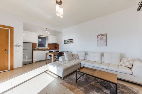 Living room and fully-equipped kitchen