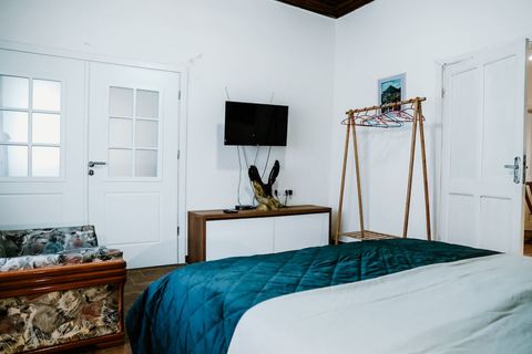 Bedroom 1 with a double bed (King Size)