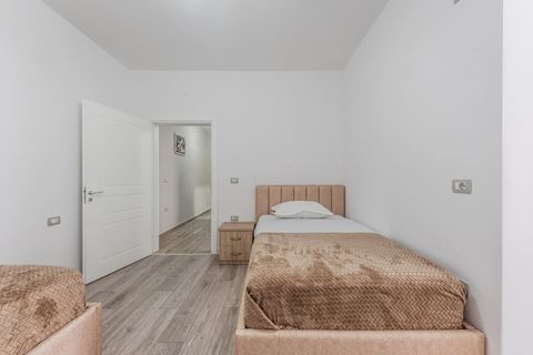 Bedroom 2 with two single beds