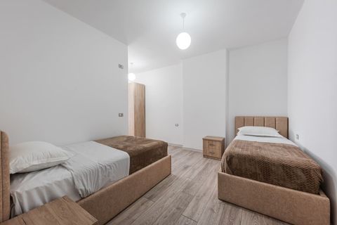 Bedroom 2 with two single beds