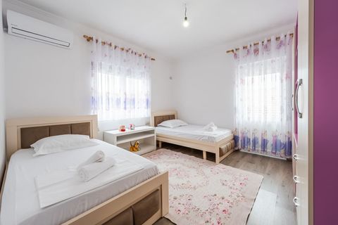 Bedroom 2 with two single beds