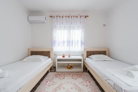 Bedroom 2 with two single beds