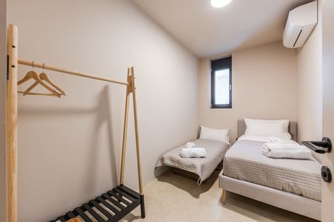 Bedroom 5 with 1 single bed and 1 portable bed