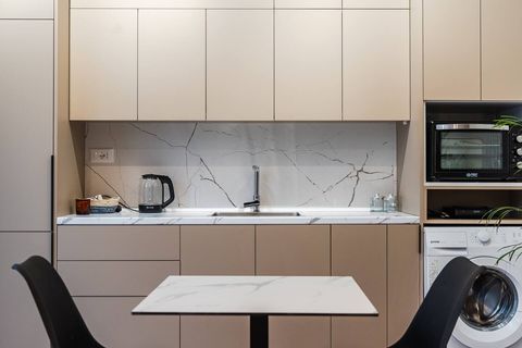 Fully-equipped kitchen and dining area