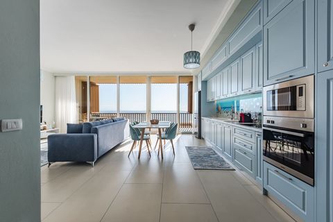 Living room and fully-equipped kitchen