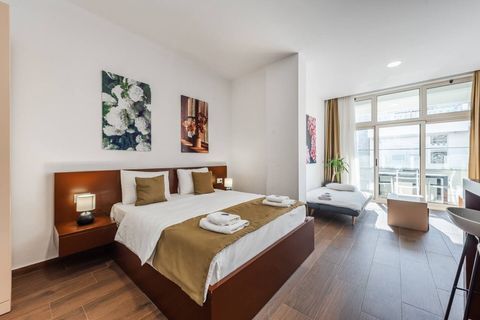 Living room and bedroom of the studio