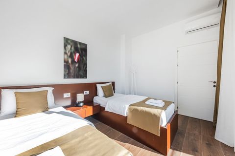 Bedroom 2 with two single beds