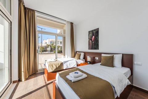 Bedroom 2 with two single beds