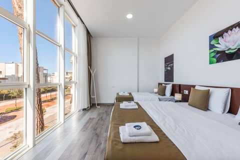 Bedroom with a double and a single bed