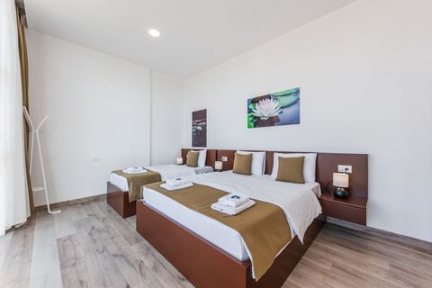 Bedroom with a double and a single bed