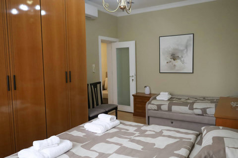 Bedroom with a double bed and a single bed