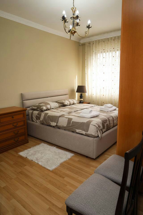 Bedroom with a double bed and a single bed