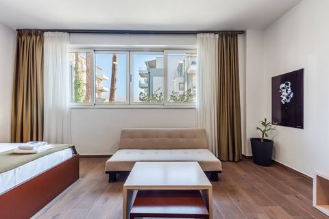 Living room and bedroom of the studio