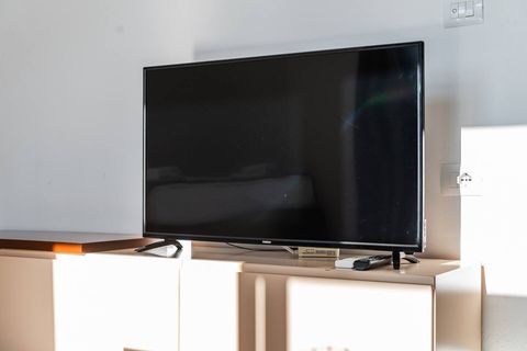 Living room and bedroom of the studio details