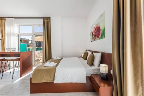 Living room and bedroom of the studio