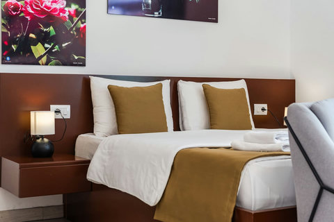 Living room and bedroom of the studio details