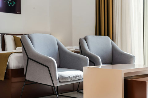 Living room and bedroom of the studio details