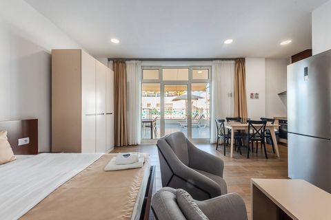 Living room and bedroom of the studio